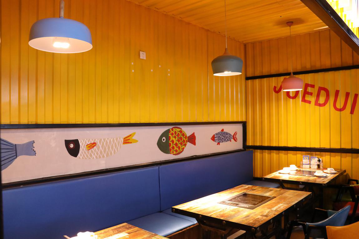 武汉这家排行第一的川味烤鱼馆，从江汉路开始声名远扬